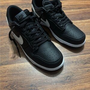 Nike Black and White Sneakers with Classic Design
